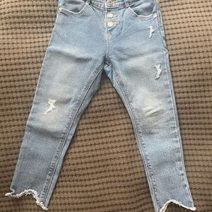 Distressed Blue Jeans